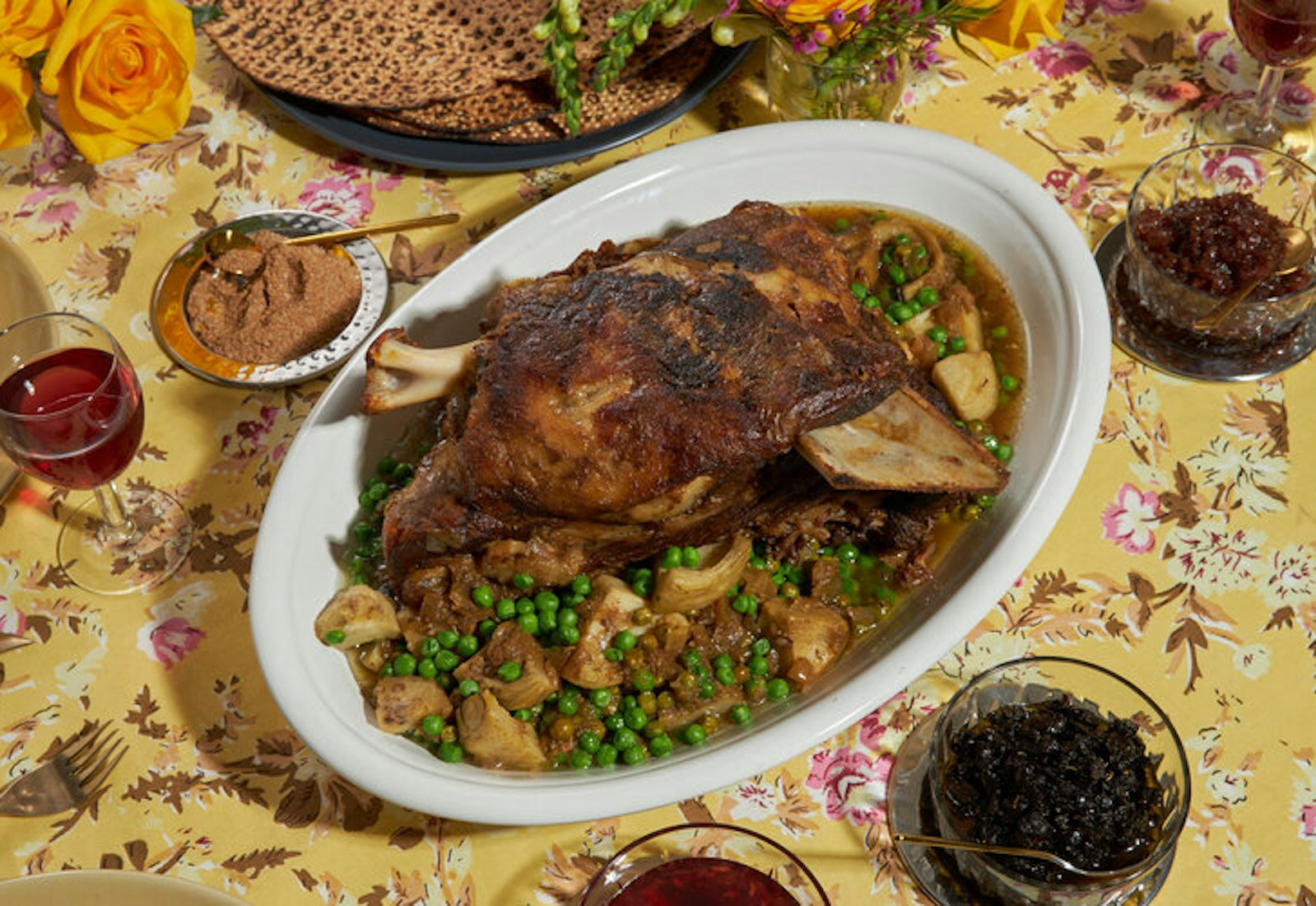 Braised lamb with sides of spices, chopped olives, confit red onions and pomegranate jam.