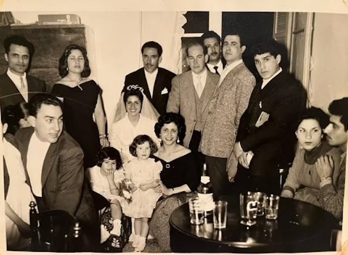 Simone (center in white dress) at a wedding in Morocco, 1957.