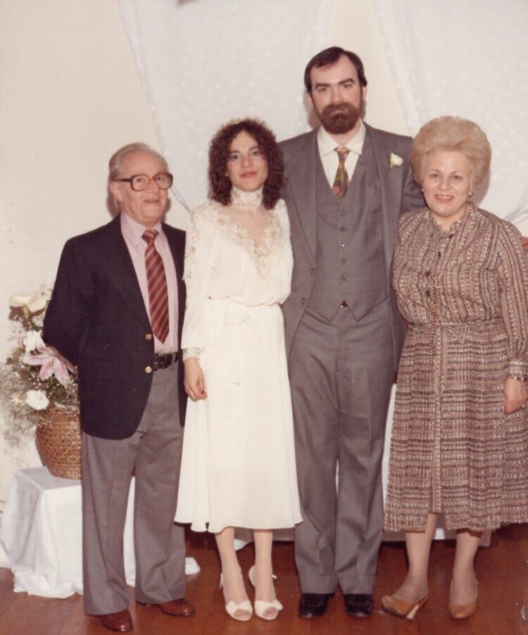 Cammy’s father (left), husband Gerard (center left), Cammy (center right), and Cammy’s mother (right) on Cammy’s wedding day in 1982.