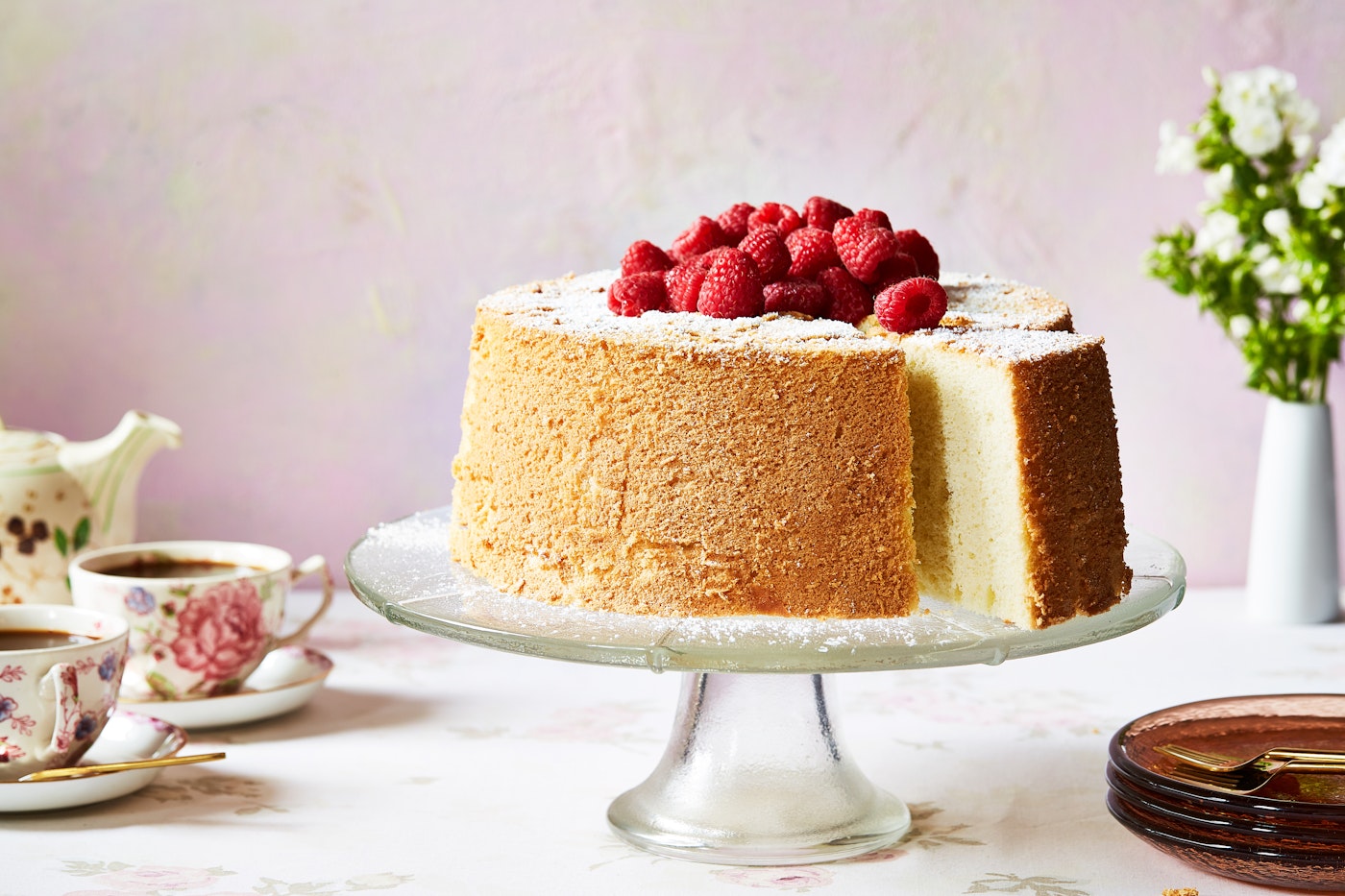 Chiffon cake on clear cake stand.