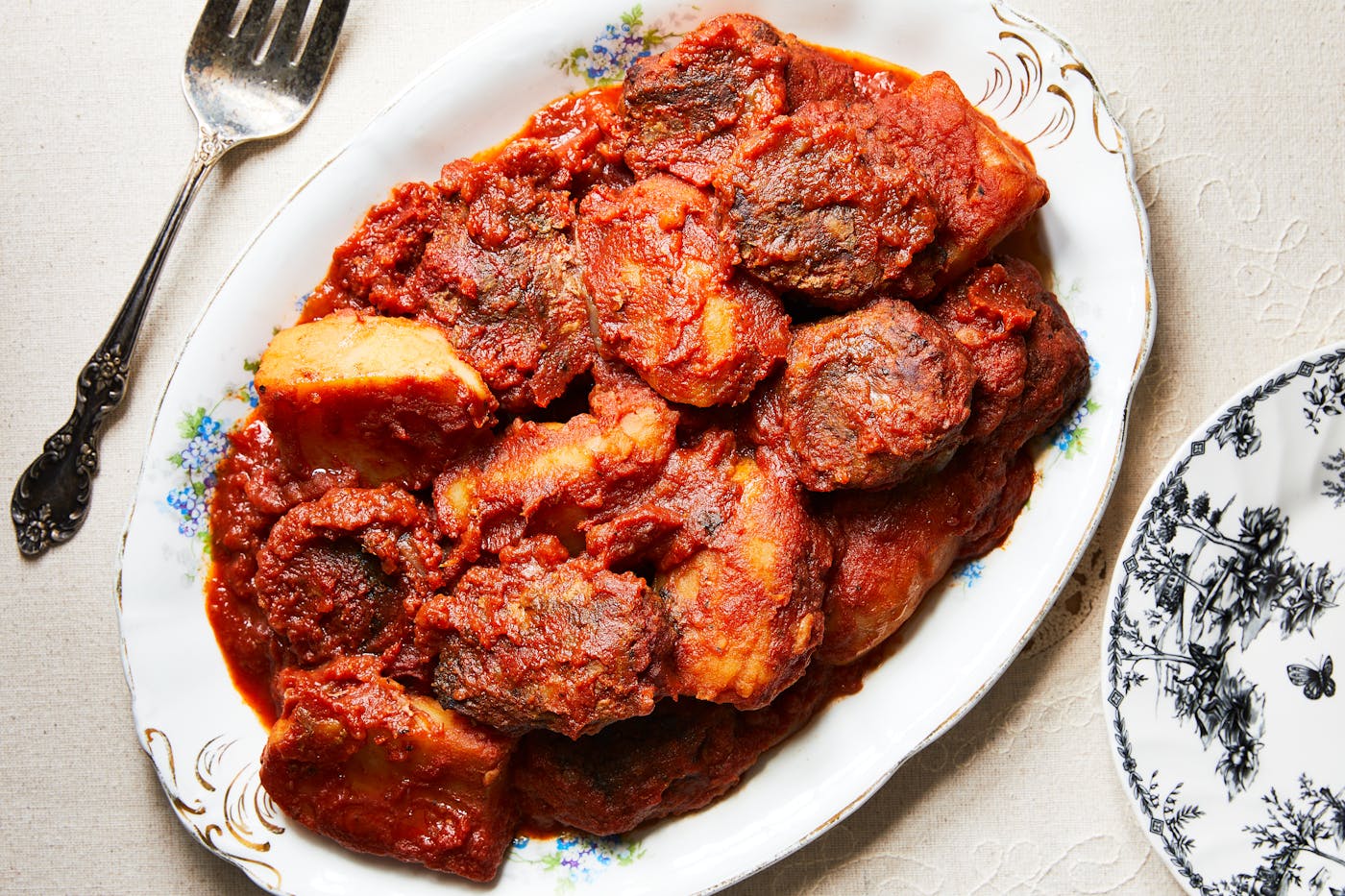 Katlet with tomato sauce and potatoes one serving platter.
