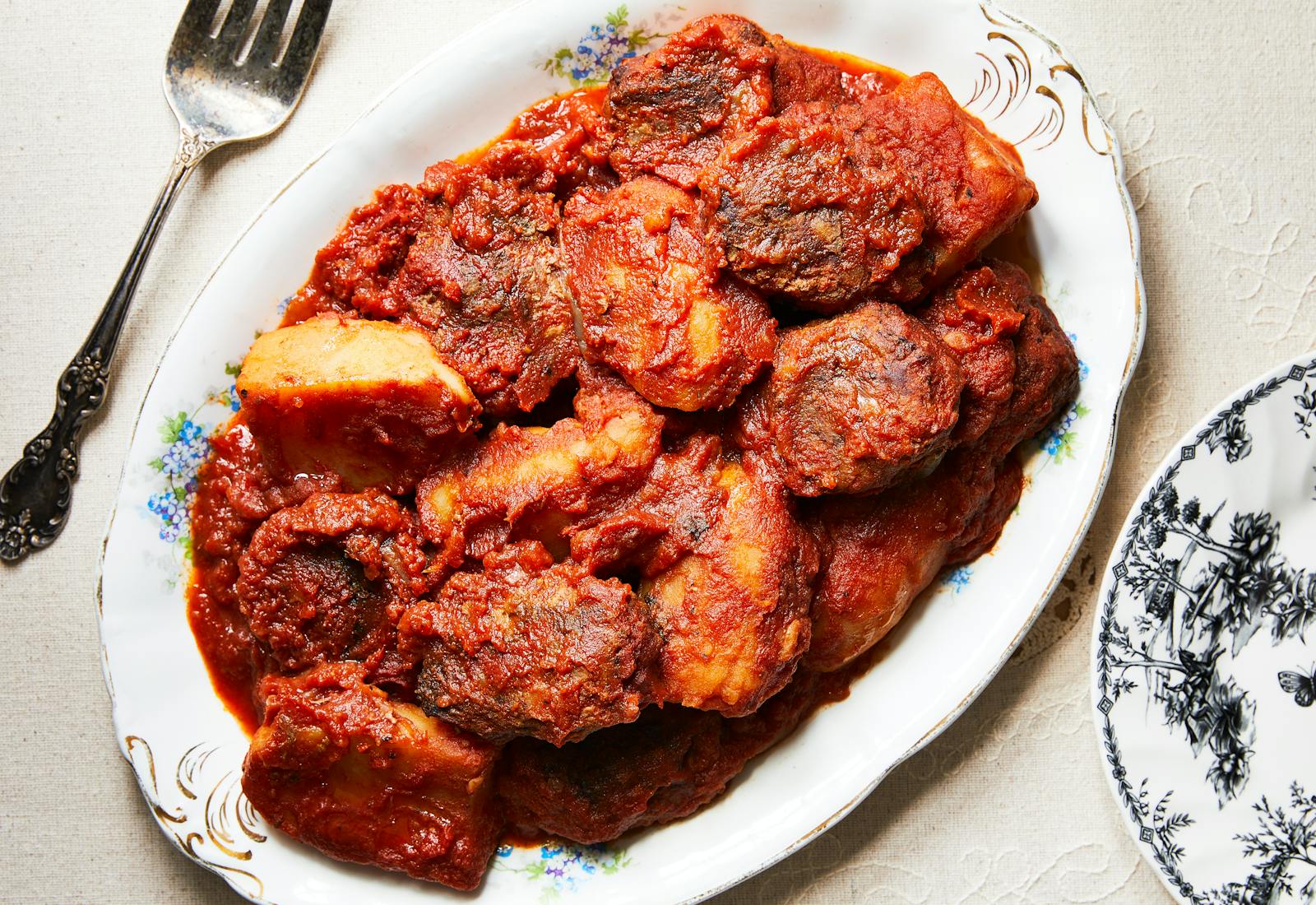 Katlet with tomato sauce and potatoes one serving platter.