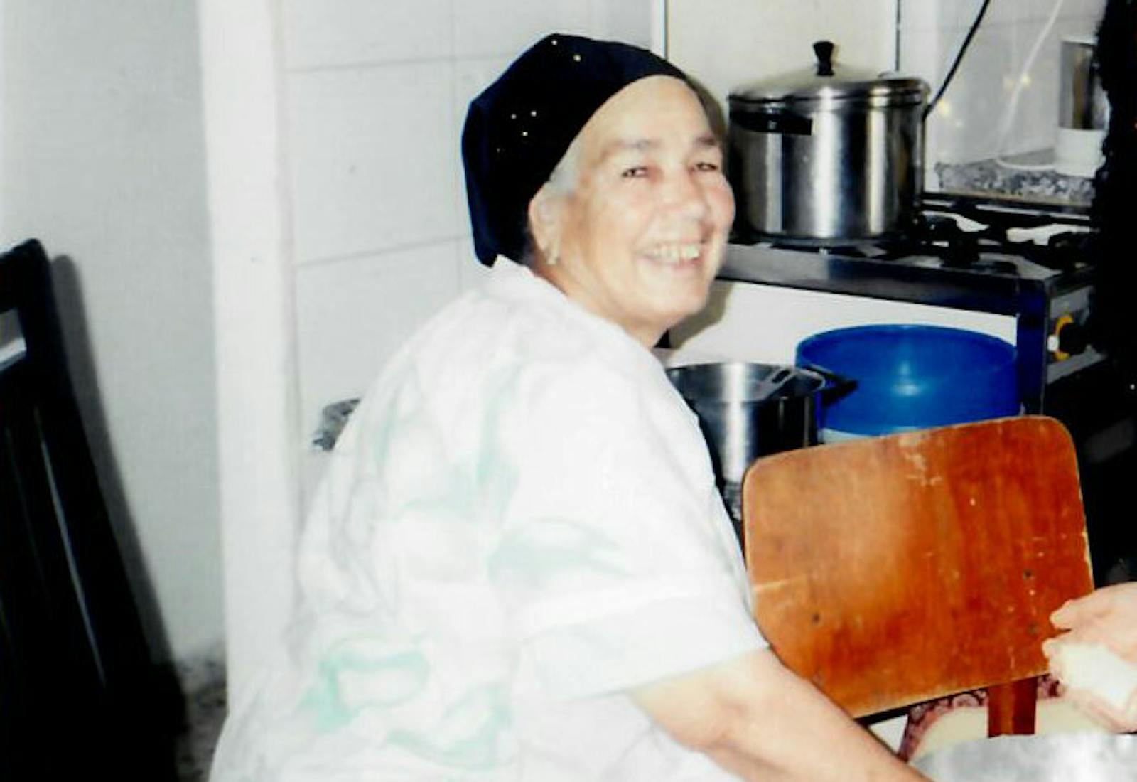 Esther preparing couscous in her kitchen in 1998.