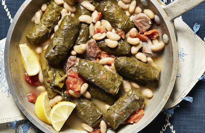 Yaprakes De Oja De Parra Kon Avas (Stuffed Grape Leaves Stewed With White Beans) image