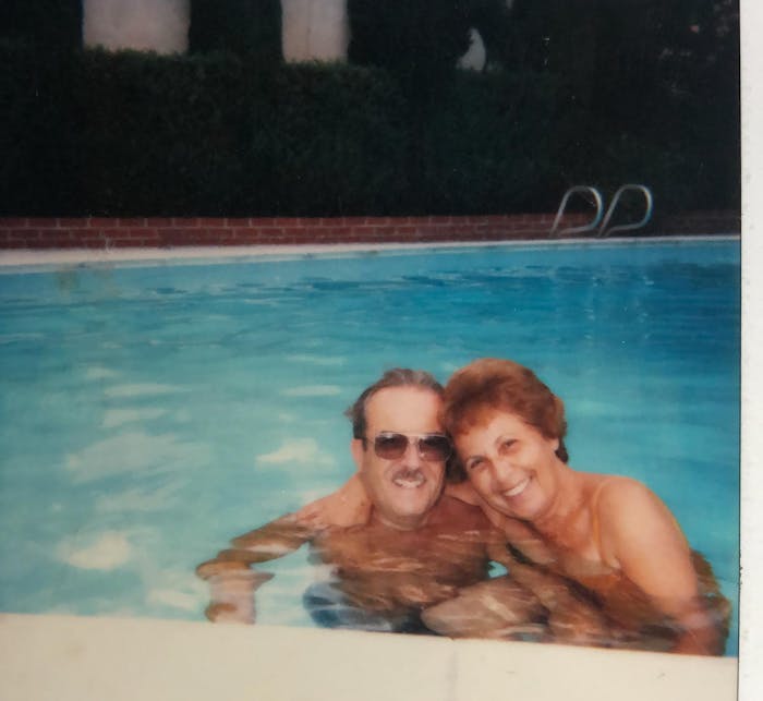 Susie's parents at the pool. 