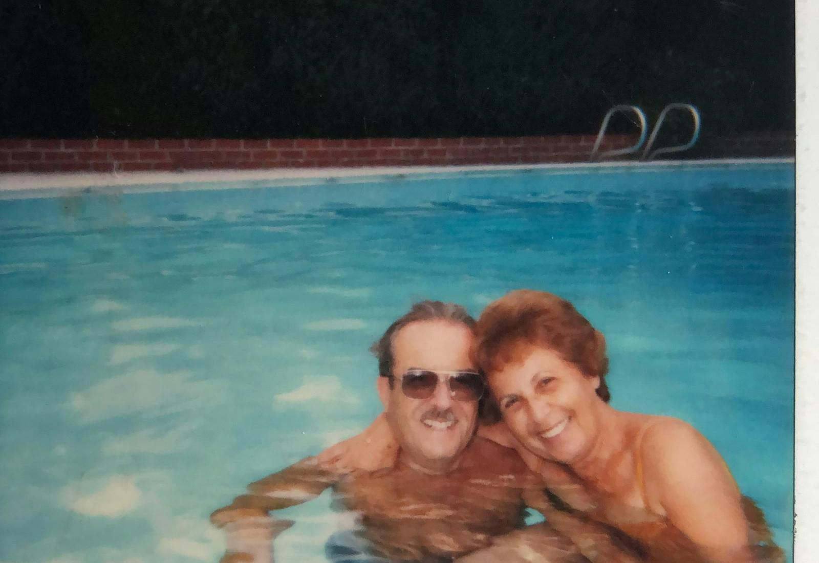 Susie's parents at the pool. 