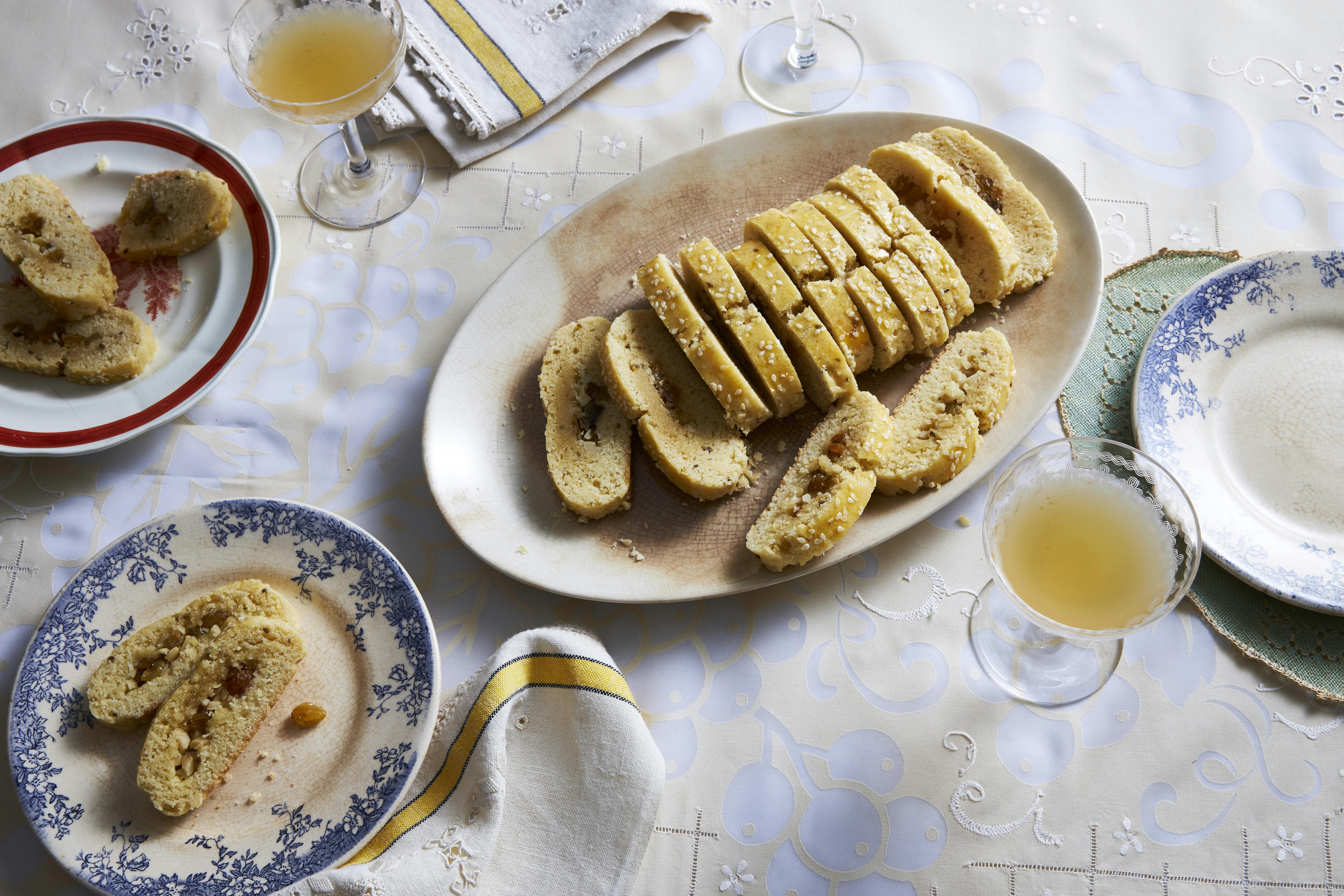 Orange blossom cookies with seeds and nuts on an oval plate. 