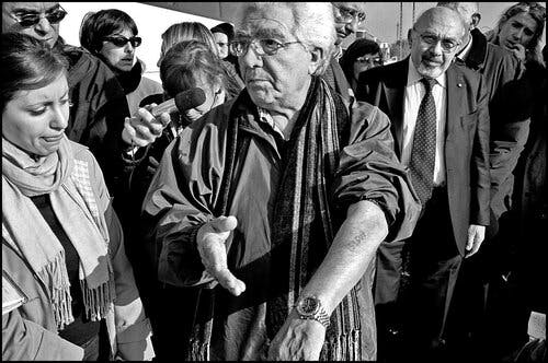 Enzo and Italo’s daughter, Caryna, visiting Auschwitz in 2005.