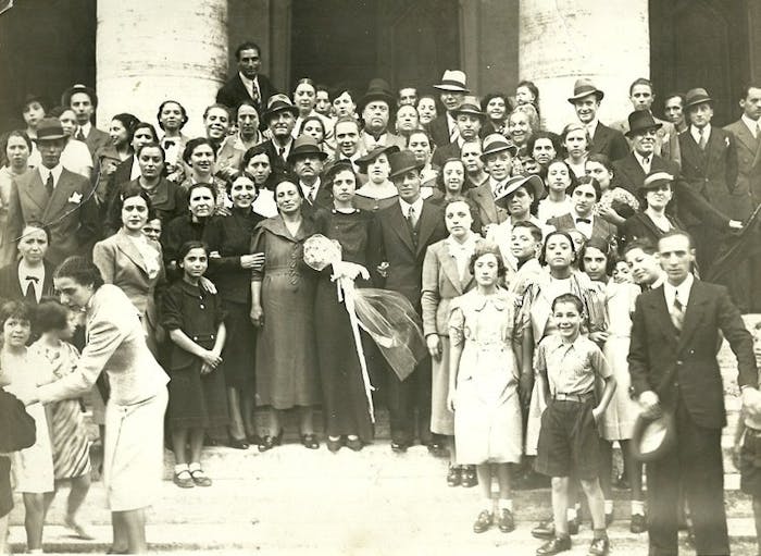 Micaela’s grandparents (center) the Great Synagogue of Rome in 1936 on their wedding day.