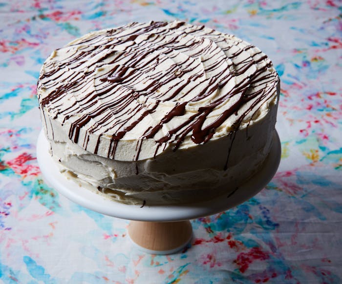 Chocolate Cake With Vanilla Icing and Bitter Chocolate Drizzle image
