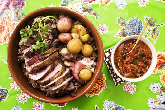 Mexican Stuffed Lamb With Spiced Tomato and Olive Sauce image