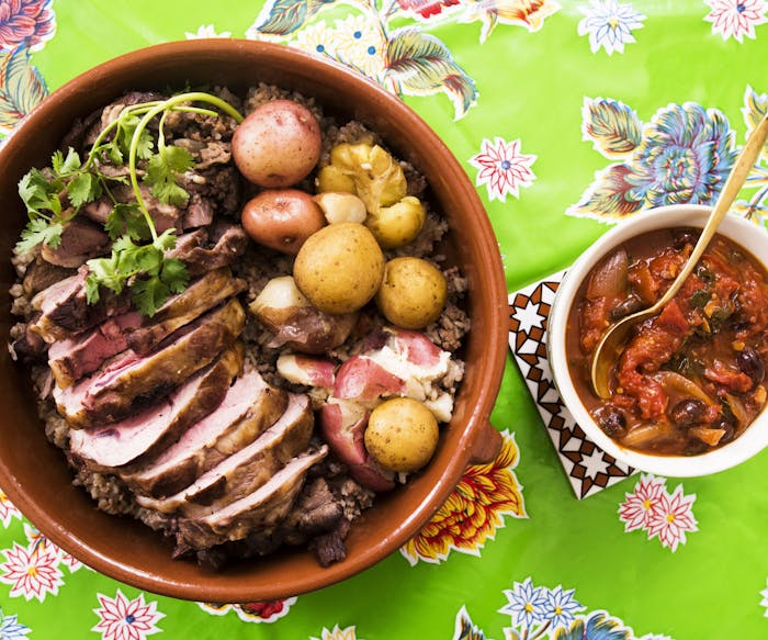 Mexican Stuffed Lamb With Spiced Tomato and Olive Sauce image