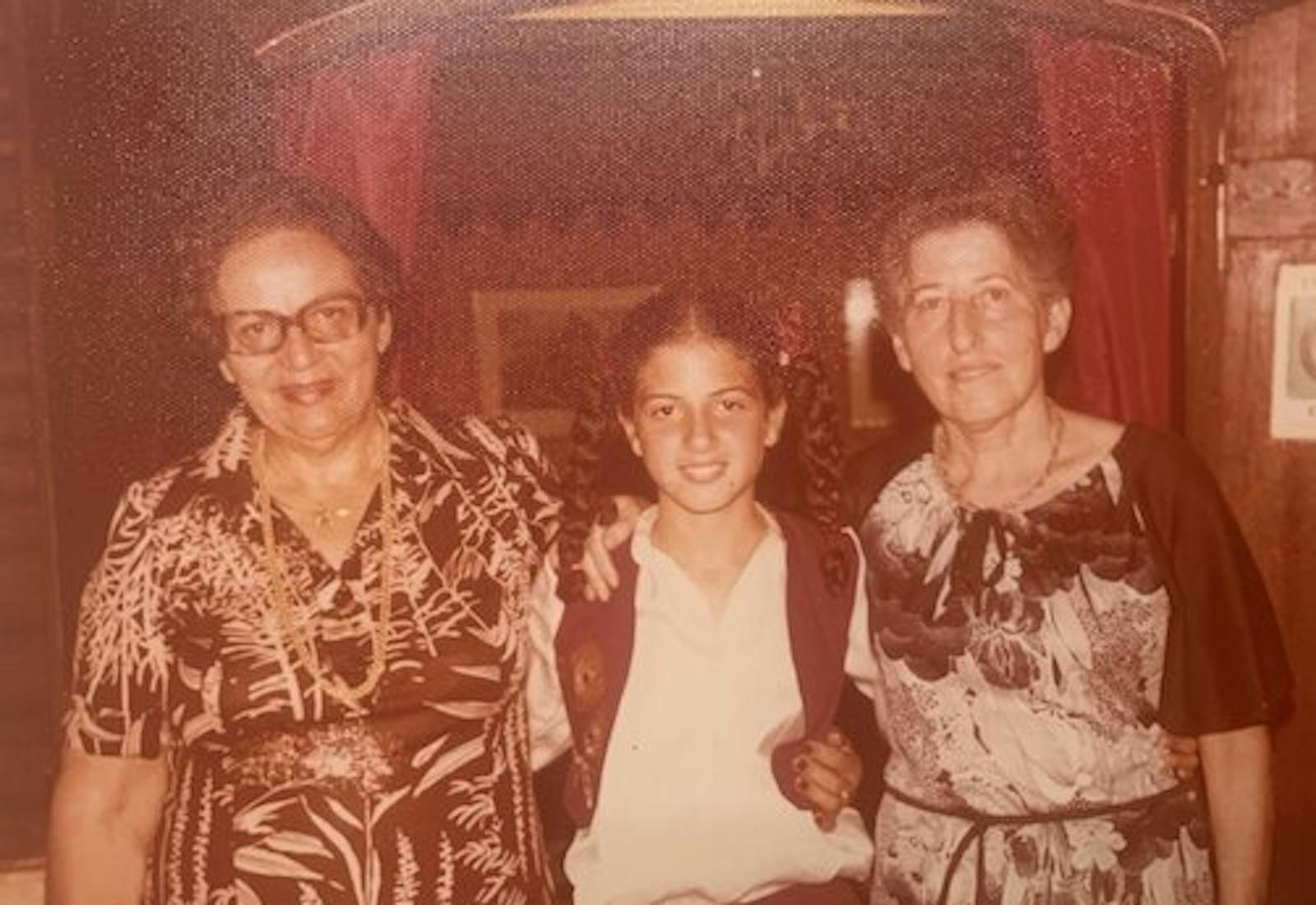 Rottem (center) with Hanom (left) and her Swiss grandmother Giza (right) at her Bat Mitzvah in Israel in 1979.