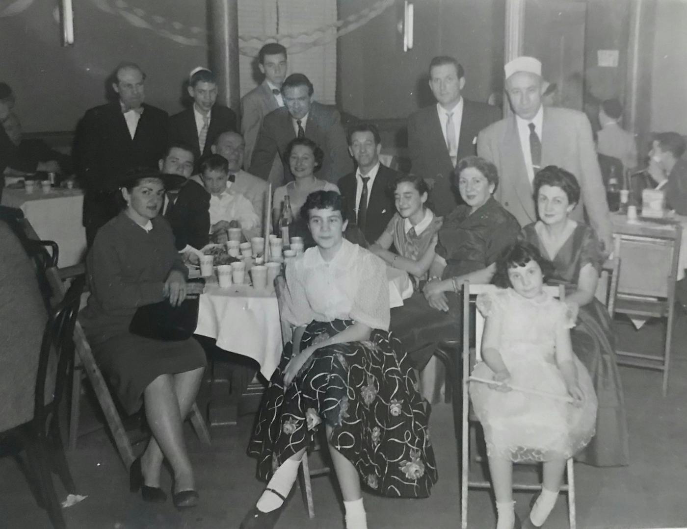 Family photo from cousin Arthur’s Bar Mitzvah, Queens, 1956. Jane is seated (front row all the way to the right) with Bertie seated directly behind her.