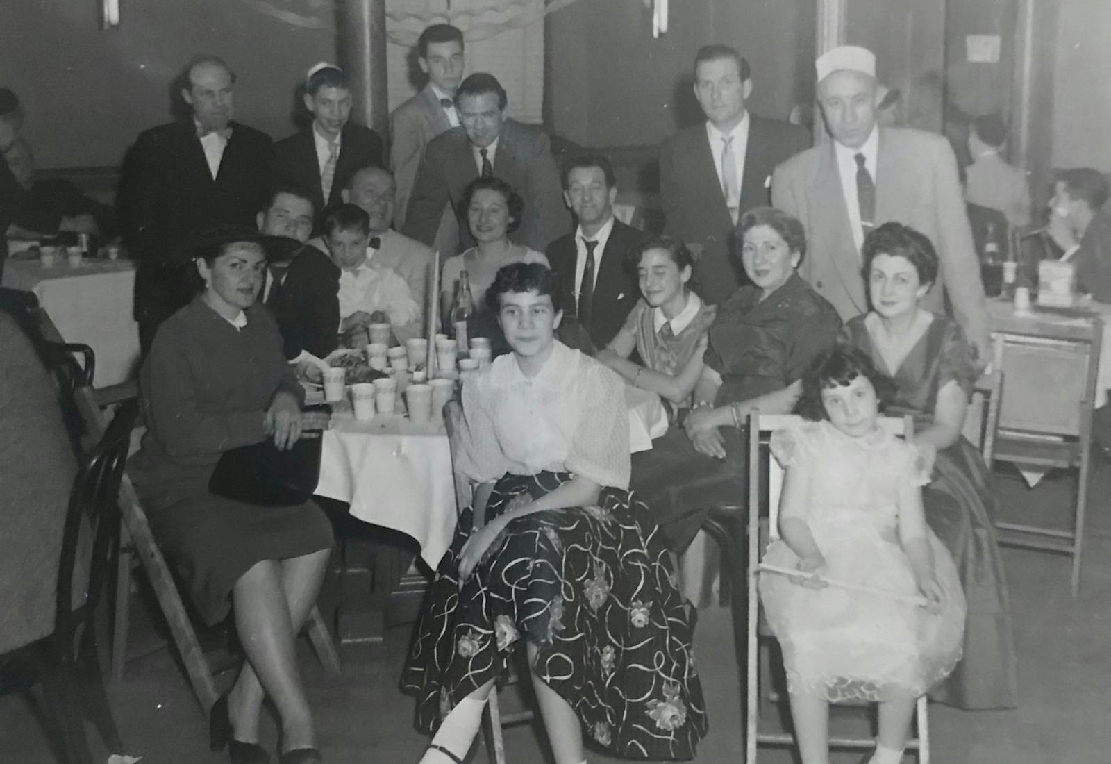 Family photo from cousin Arthur’s Bar Mitzvah, Queens, 1956. Jane is seated (front row all the way to the right) with Bertie seated directly behind her.