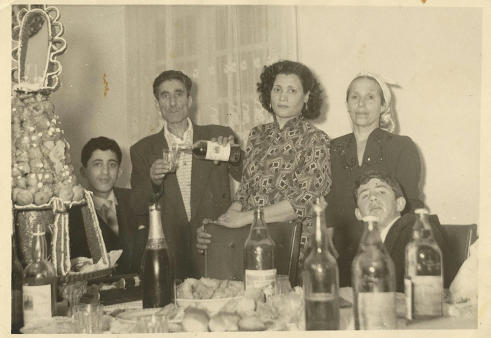 Joanna’s grandparents, Janet and Nissim, (center) in 1943
