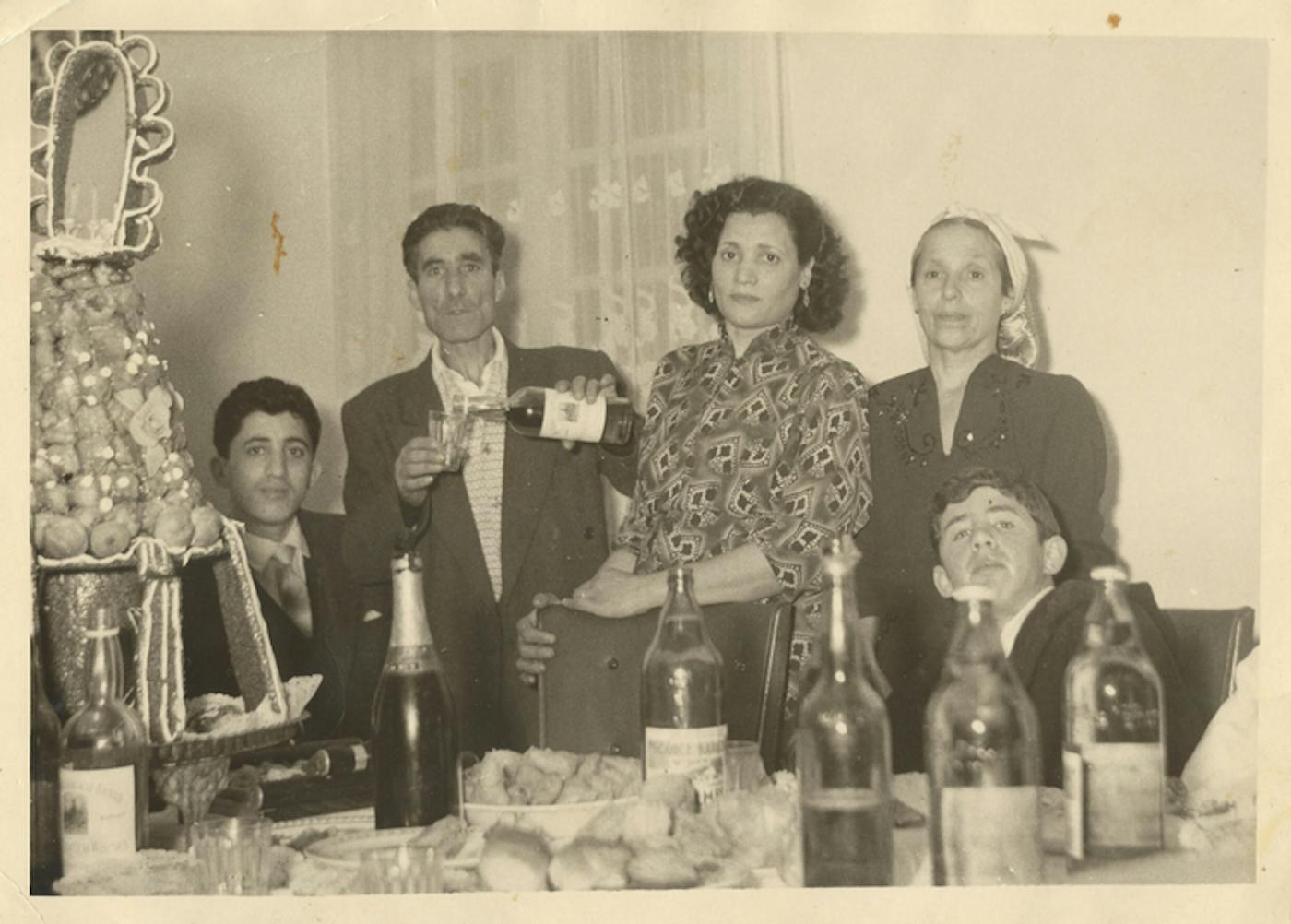Joanna’s grandparents, Janet and Nissim, (center) in 1943