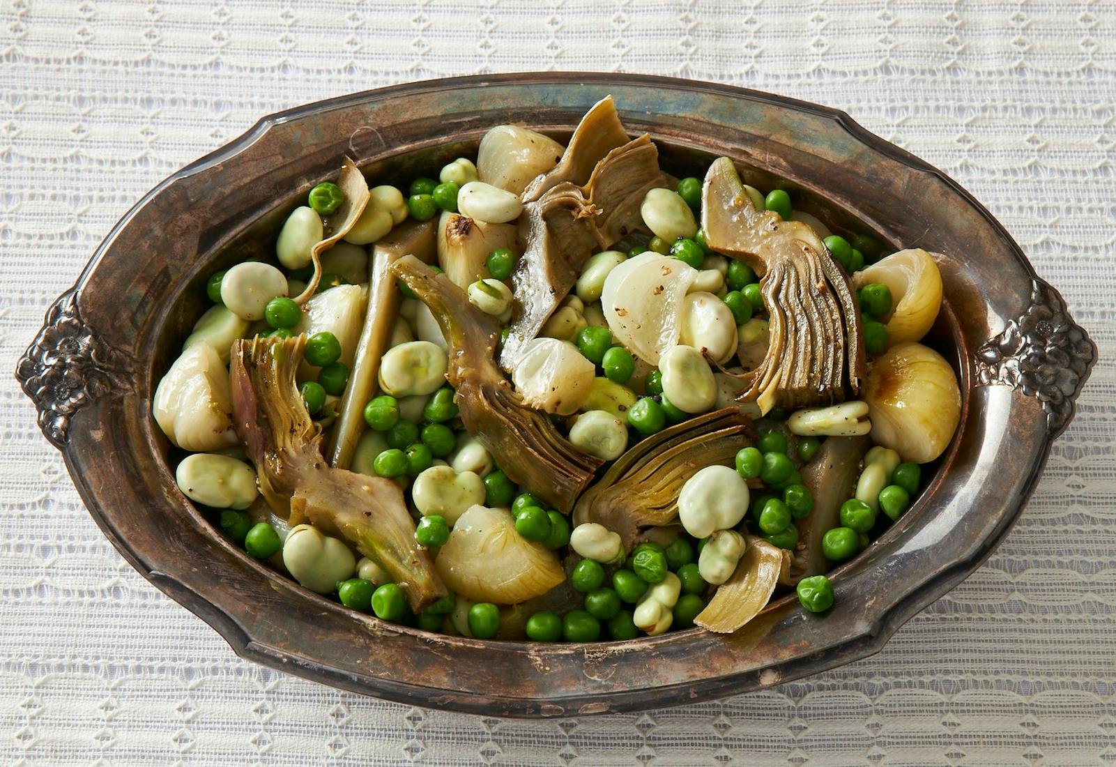 Vignarola in brown casserole dish.