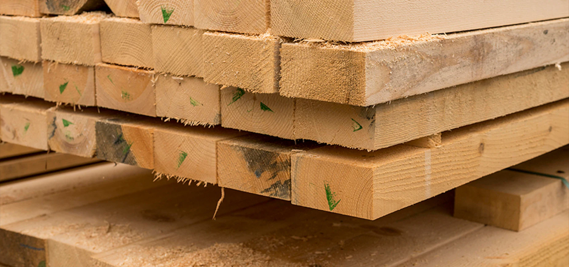close of up a pile of cut lumber