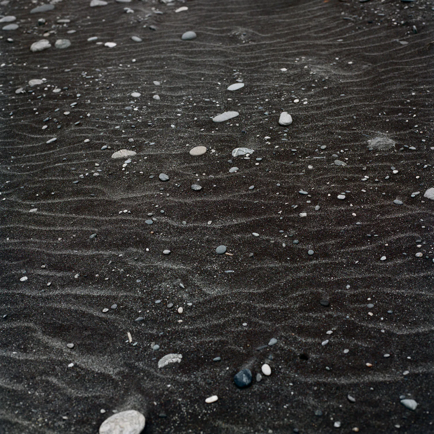 Black sand by Caroline McQuarrie