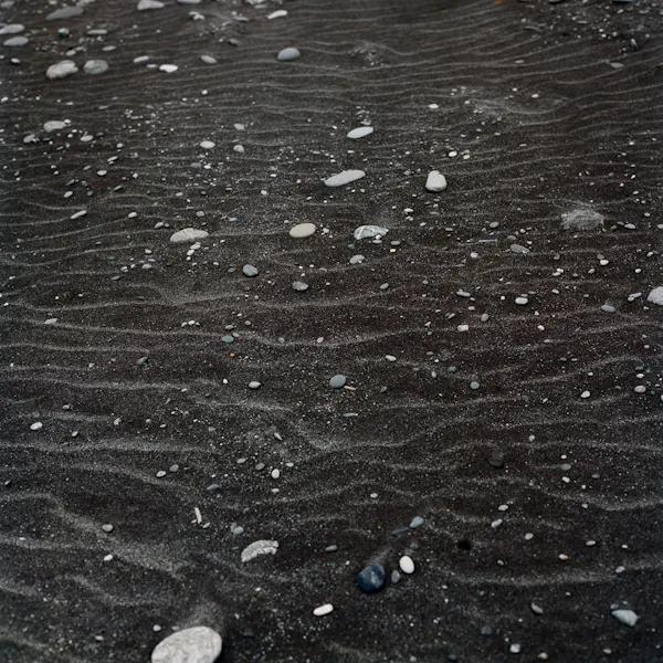 Black sand by Caroline McQuarrie