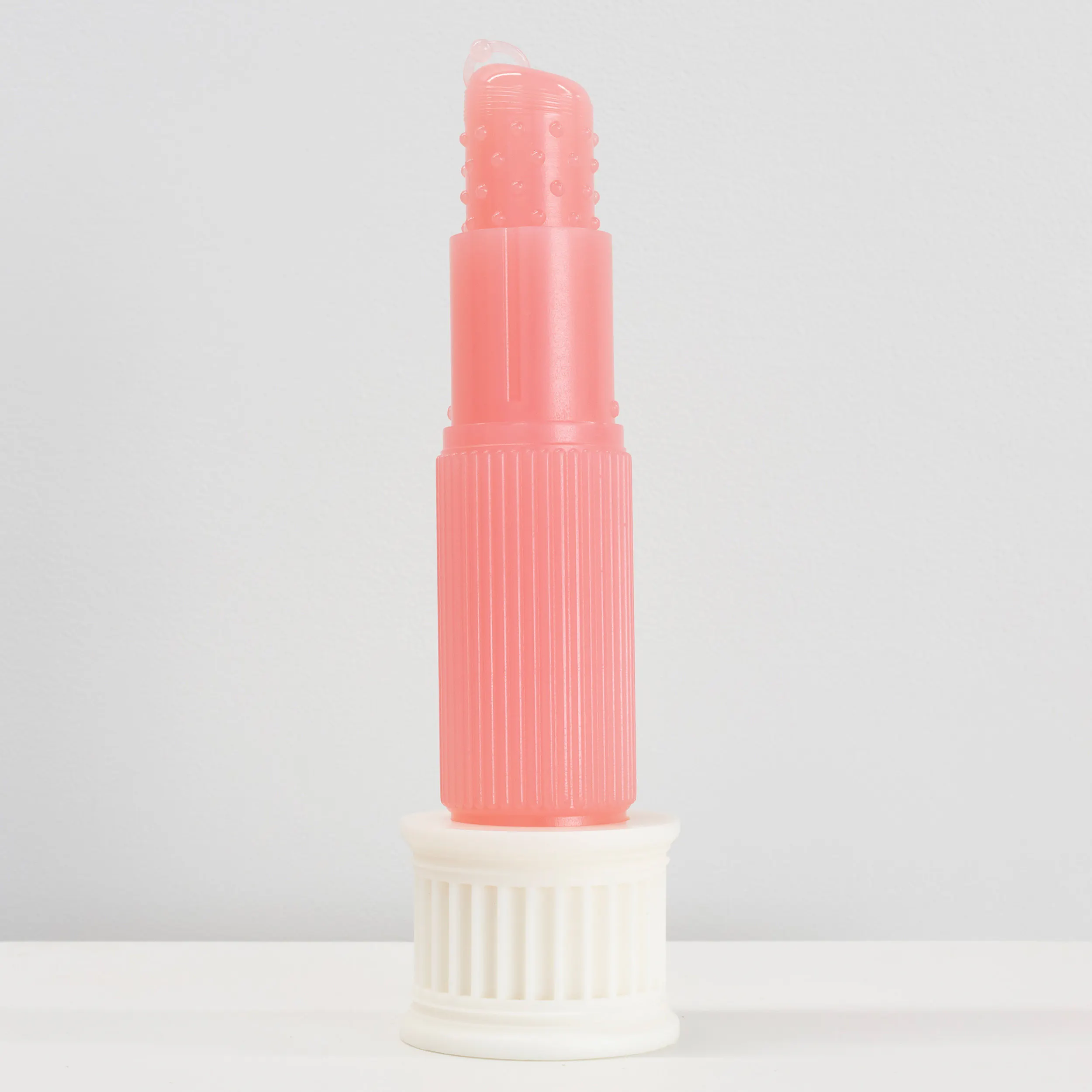 Lustre (Glo-pink, medium) and white stand by Caitlin Devoy