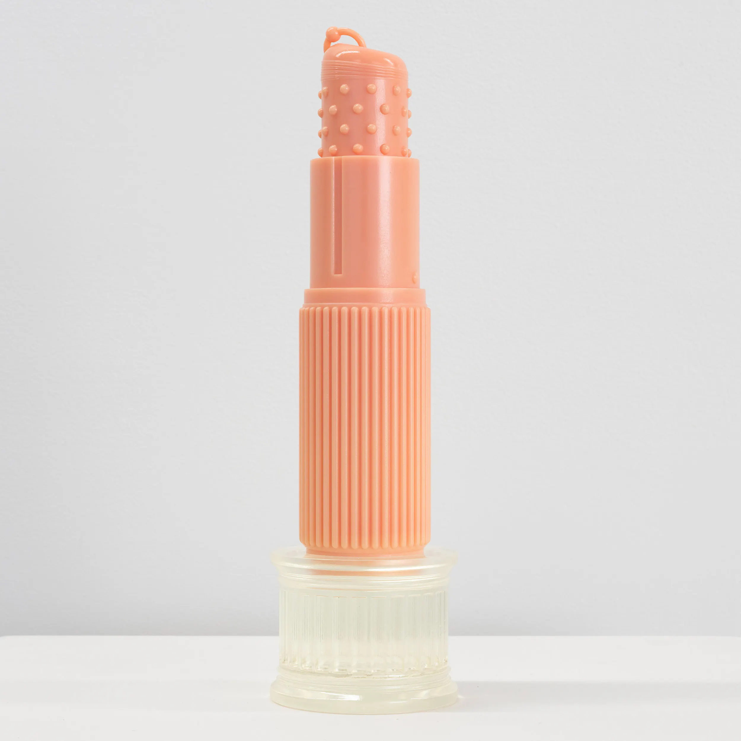 Lustre (Peachy, medium) and white stand by Caitlin Devoy