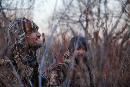 Hunters in camouflage gear