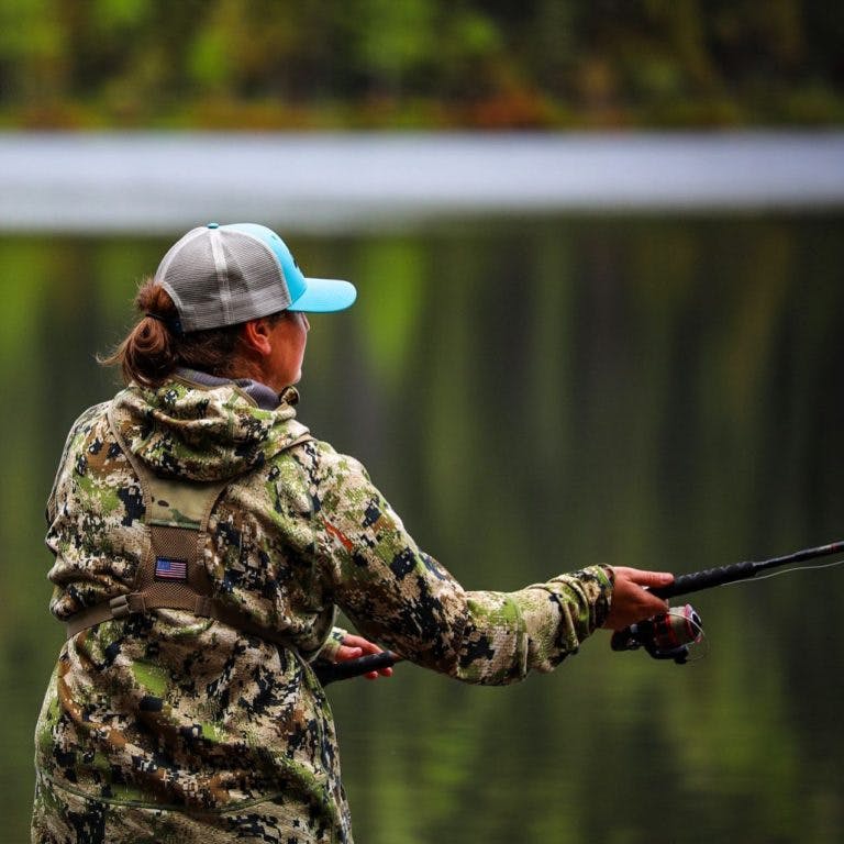 Camo Jacket Fishing by Water