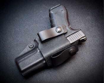 Pistol in holster