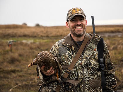 Hunter with Duck