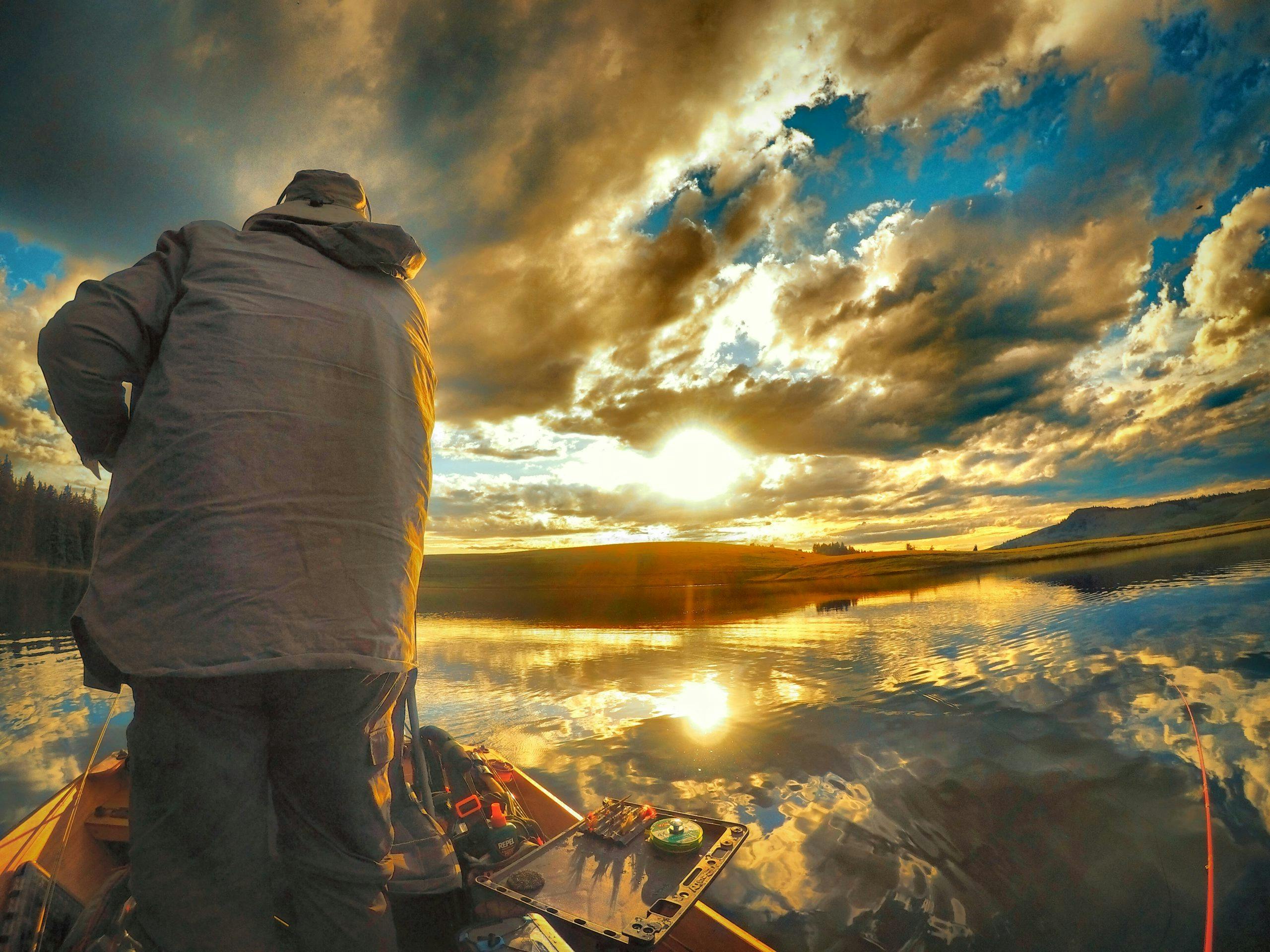 Fisherman standing on boat