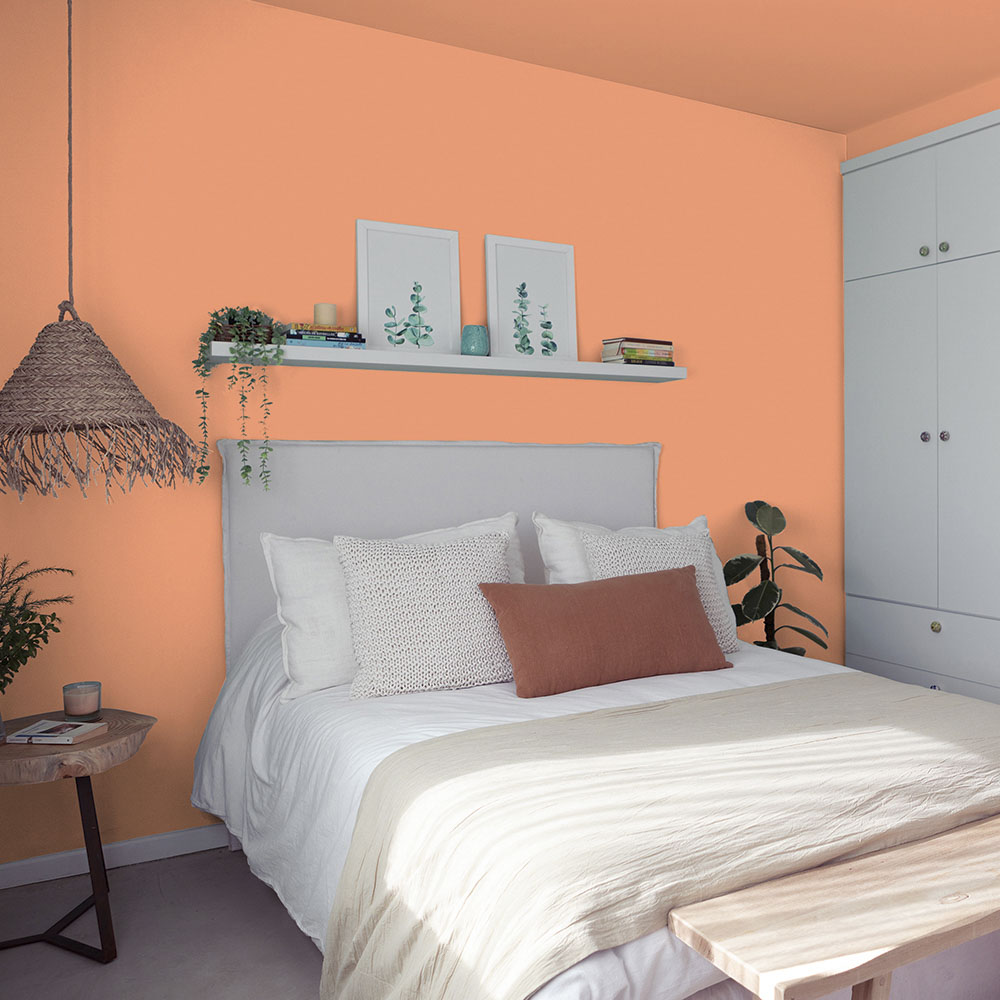 bedroom painted with Coral Silk