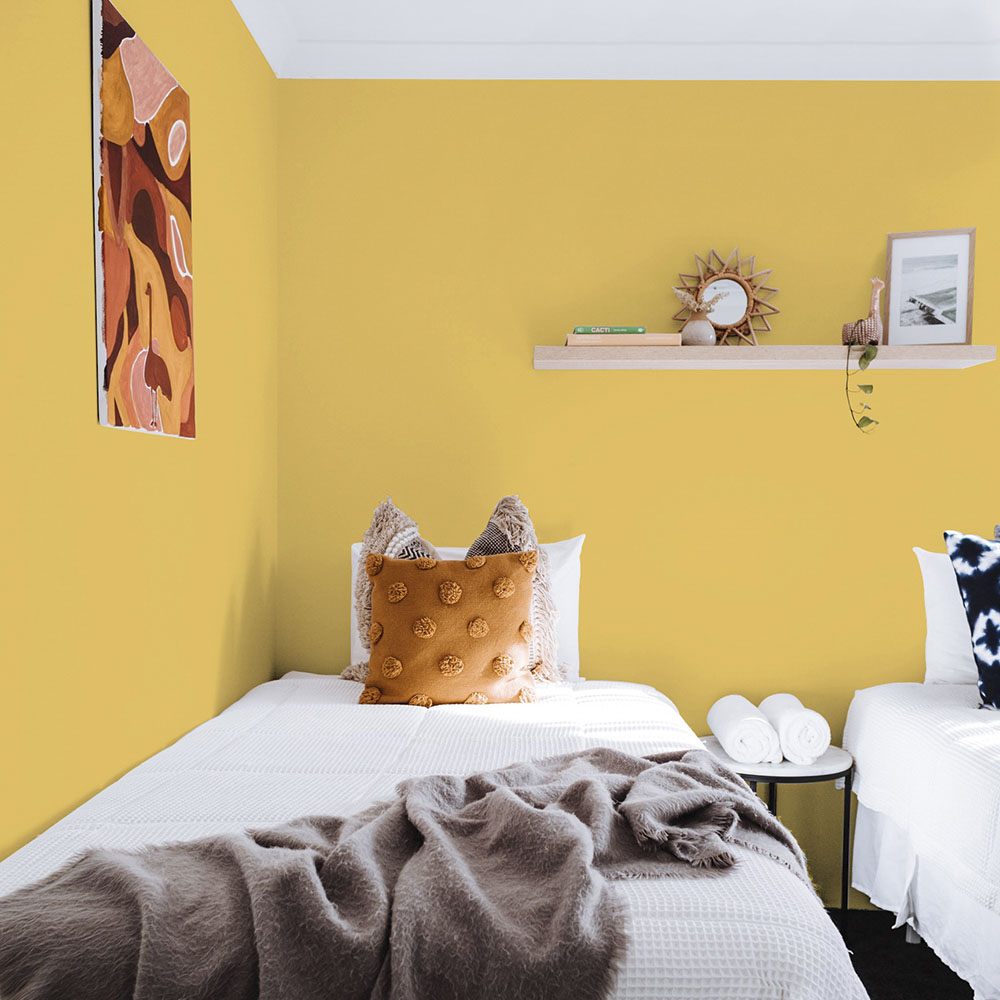 Lively yellow bedroom walls 