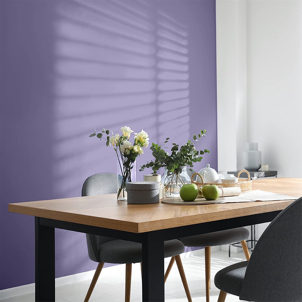 Dining room painted in a deep violet hue