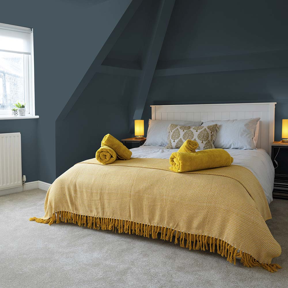 Bedroom painted in Wing Commander blue