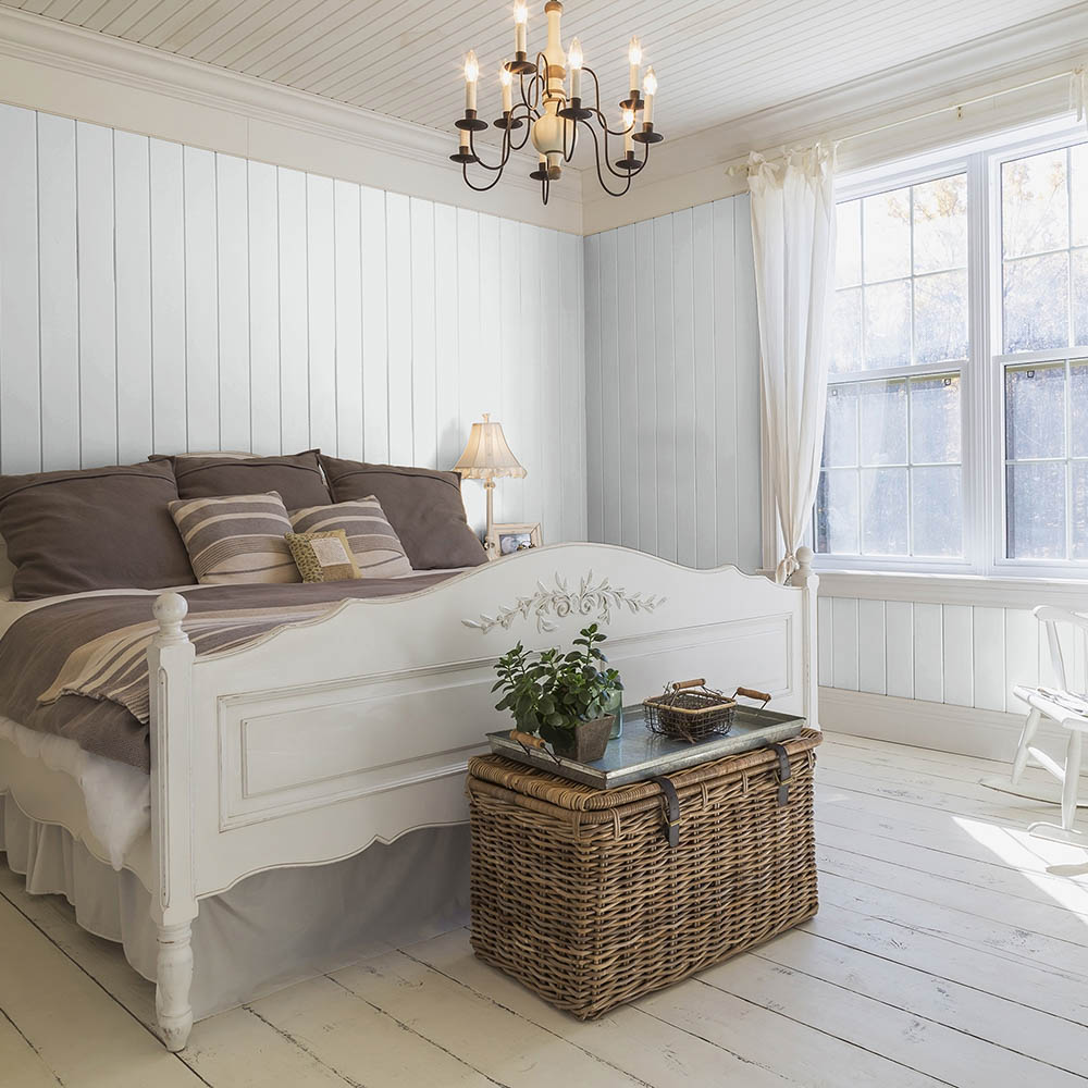 Bedroom painted with a light grey paint colour