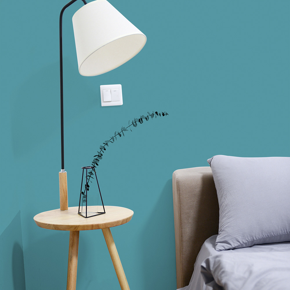 Bedroom painted in brighter blue