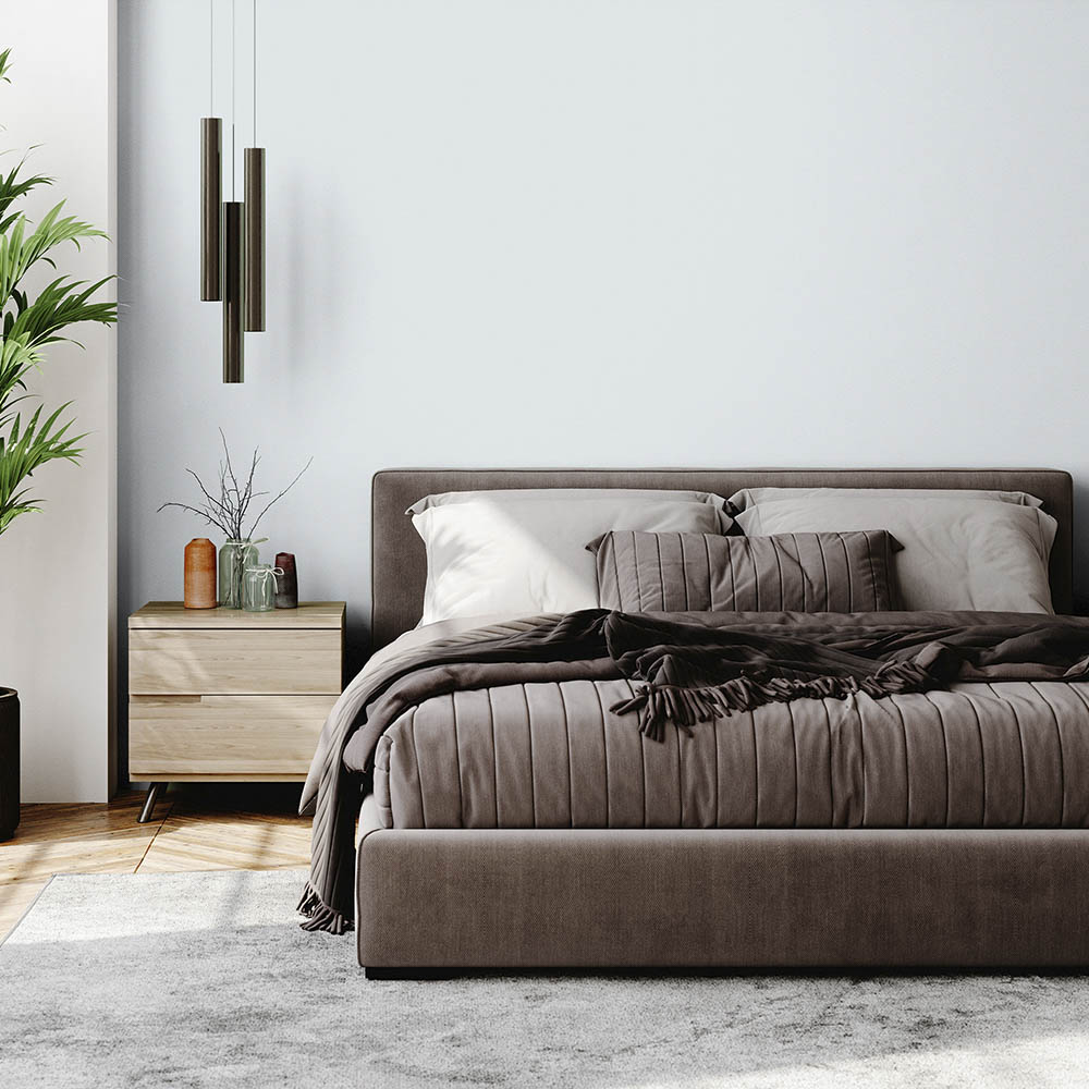 Bedroom painted with a pale grey paint