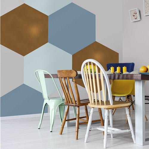 vibrant hexagonal dining room with grey, blue, and metallic paints