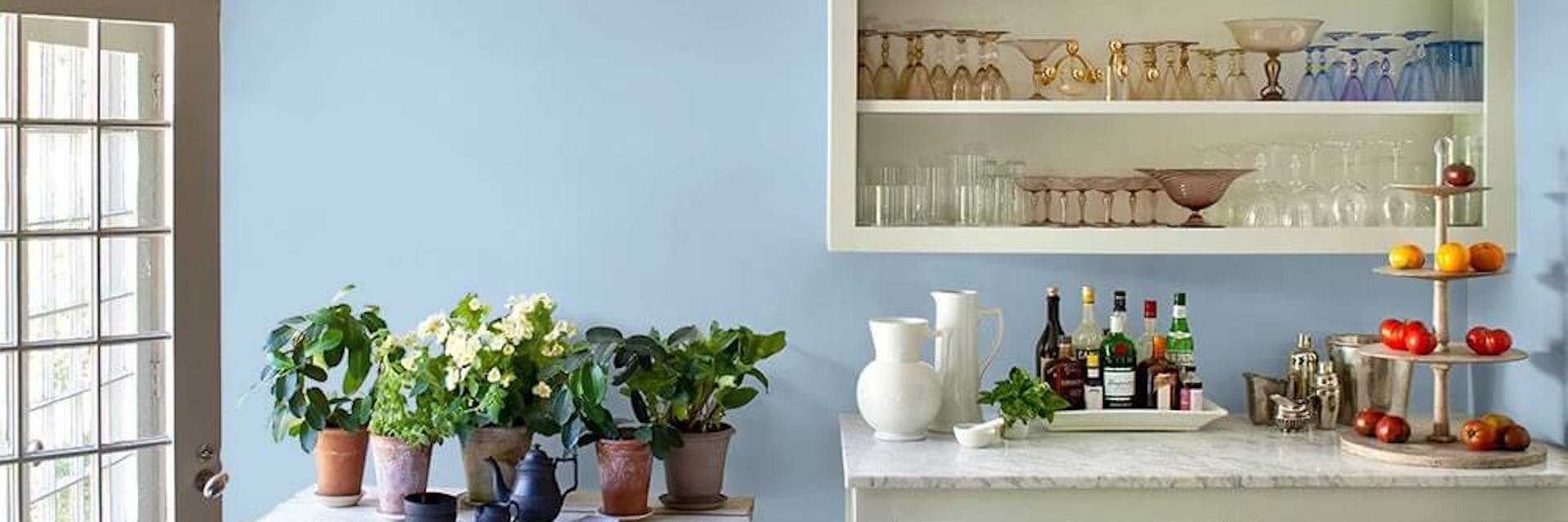 Modern kitchen painted with a pale blue paint colour