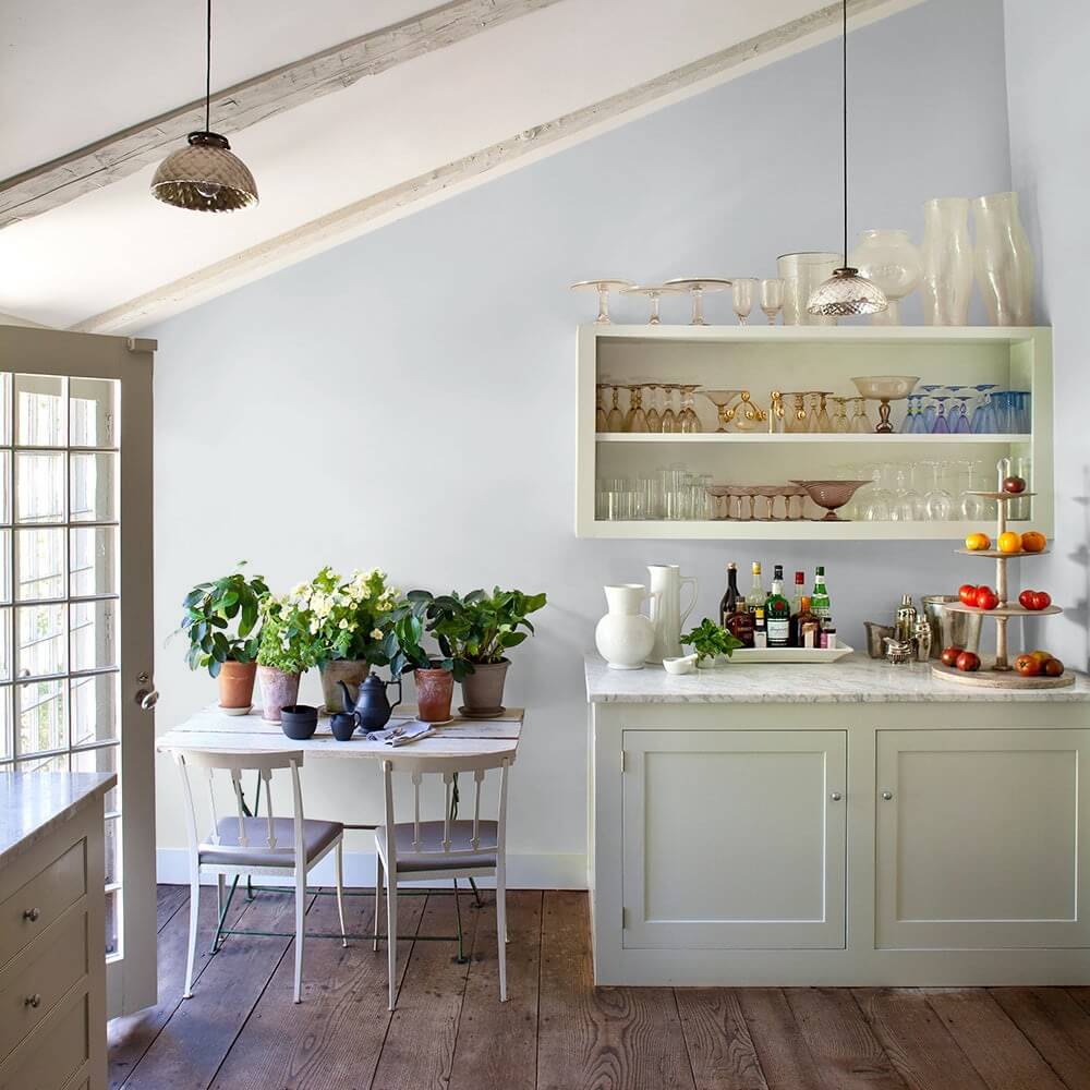Light and airy kitchen painted with a pale grey hue