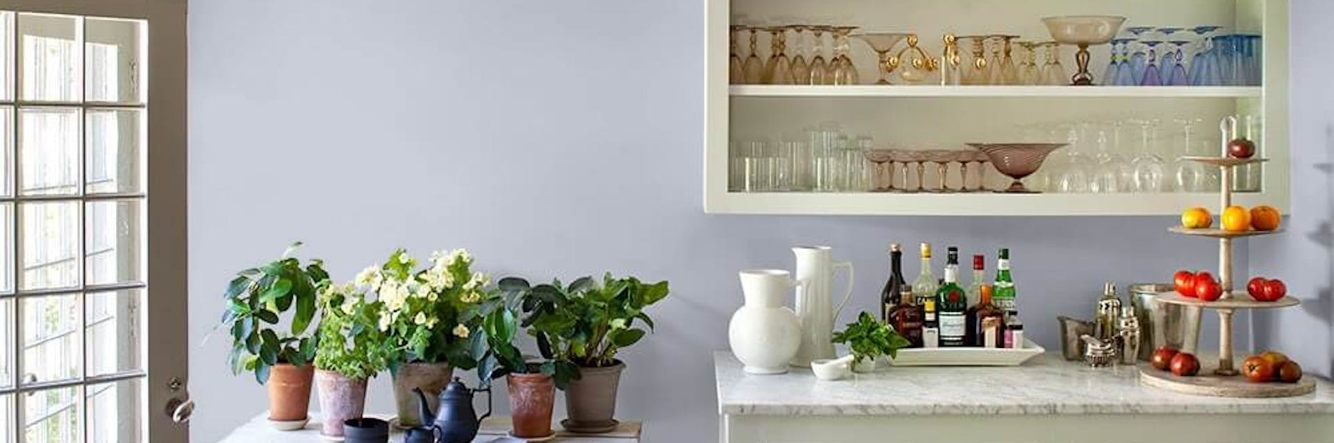 Kitchen painted with a pale purple paint colour