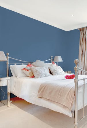 bedroom painted with vintage denim blue paint