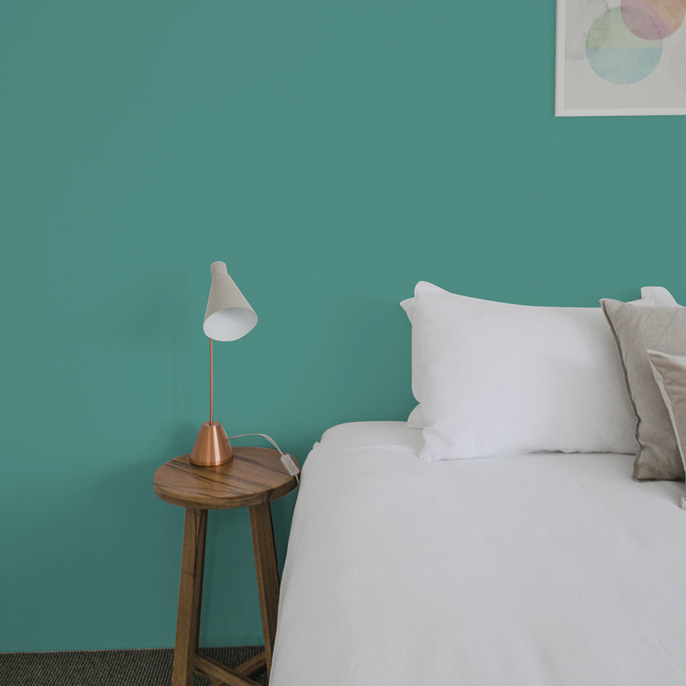 teal bedroom wall painted with Teal Taffeta