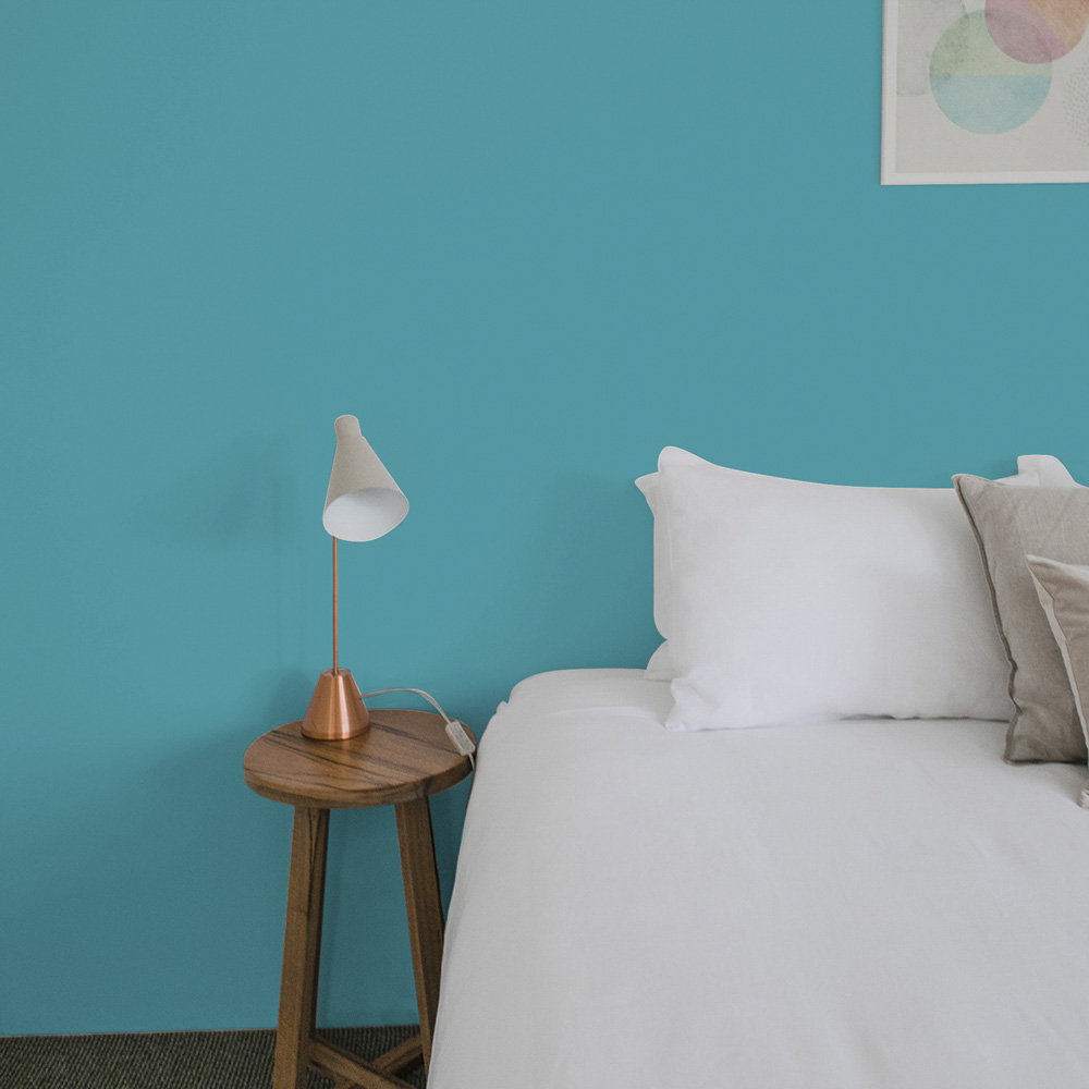 Bedroom painted in a brighter blue 