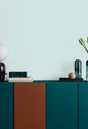 Sideboard with a wall painted in Cave Pearl
