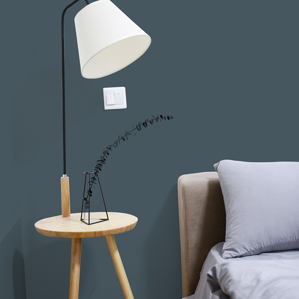 Bedroom painted in a mid-blue paint colour