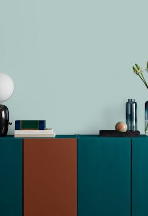 Sideboard with a wall painted in Sea Sprite