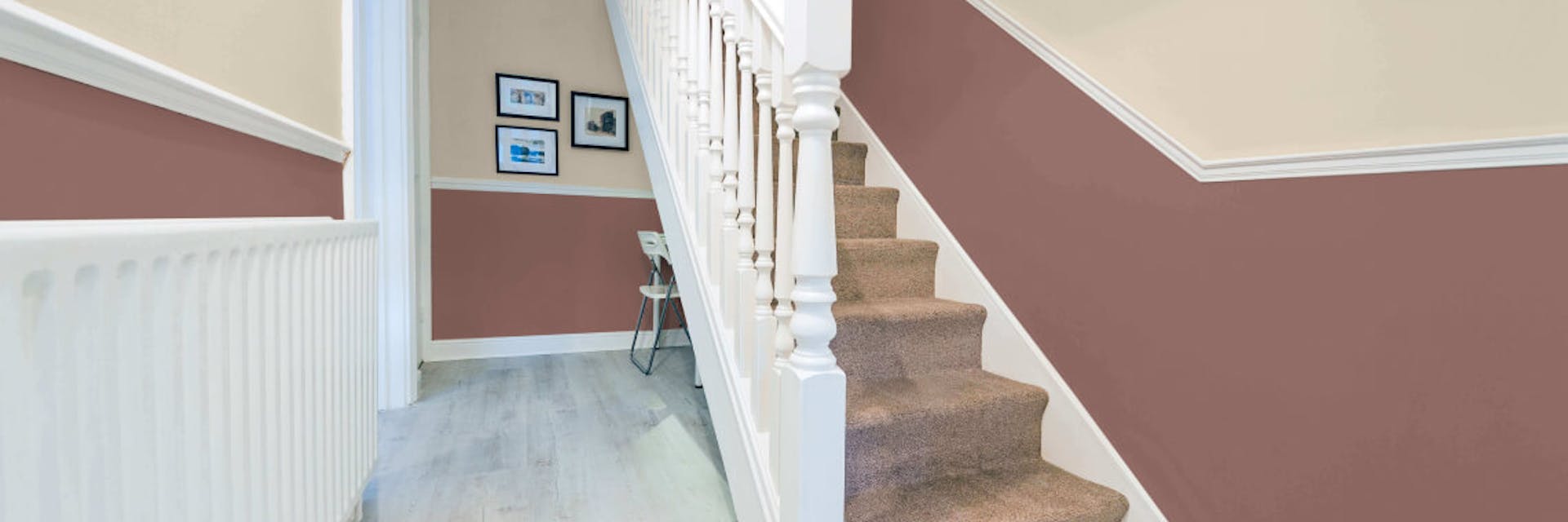 Hallway painted with a Johnstone's cream and red paint colours